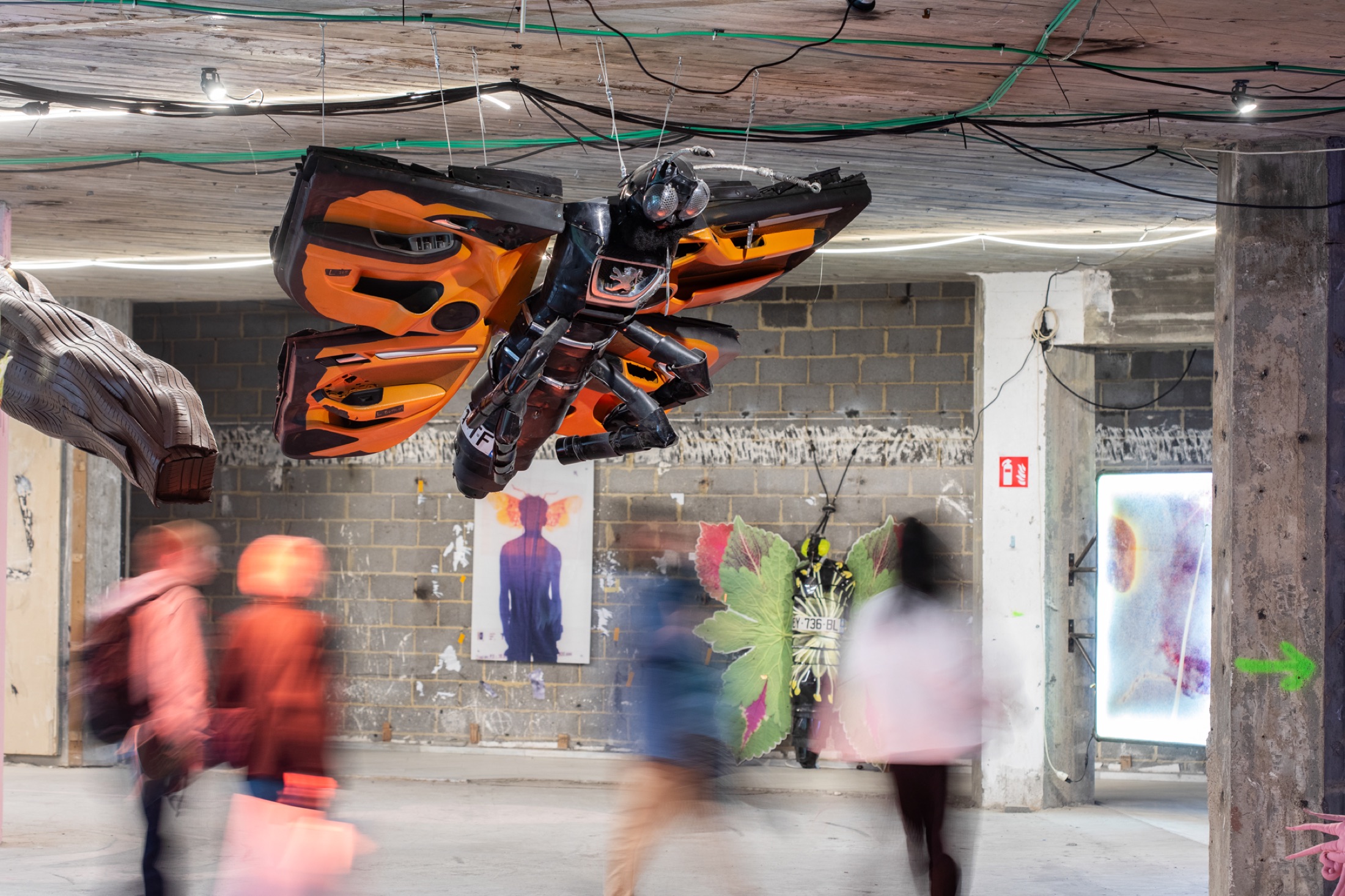 Past edition · crowd through suspended sculpture installation