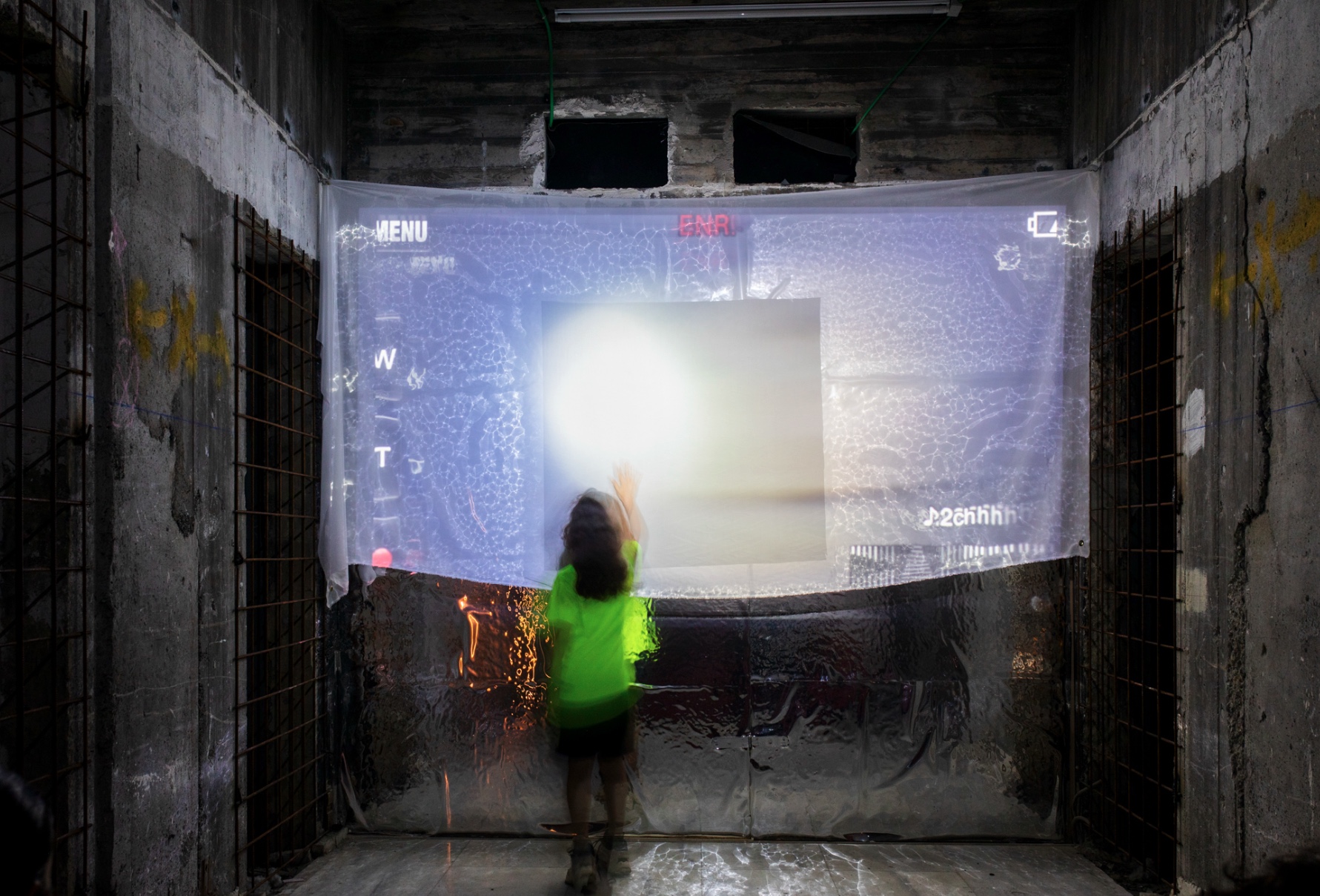 Past edition · projection screen with figure